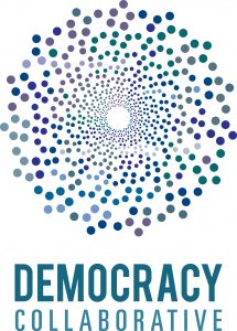 Logo for the Democracy Collaborative. Coloured dots in torus pattern.